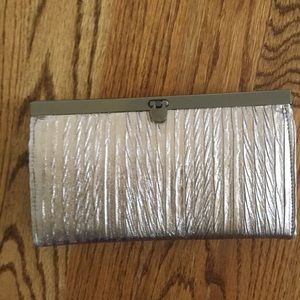 Metallic, like new clutch